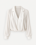 Ivory draped V-neck blouse, front studio view styled with hem folded under