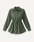Front studio view of green drawstring-waist blouse