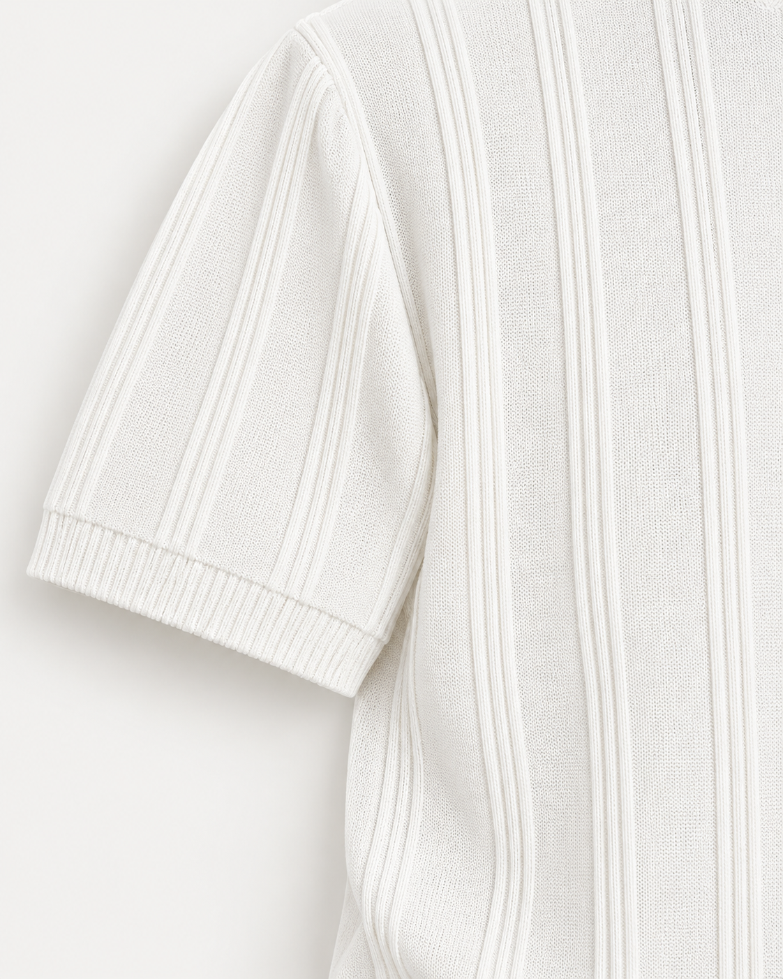 White textured zip polo knit and sleeve cuff detail