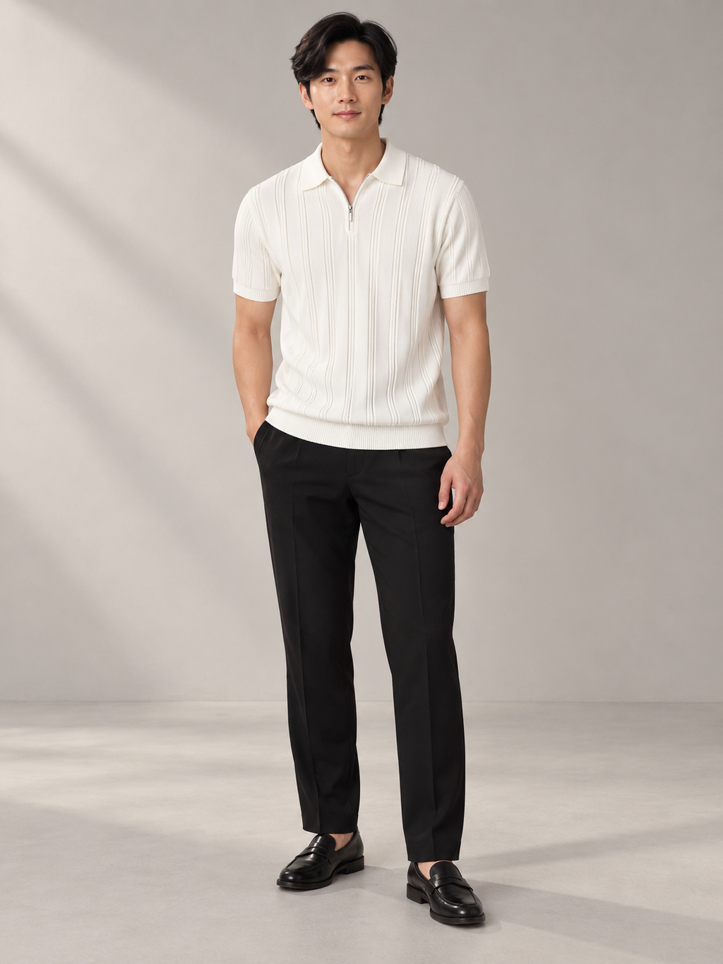 Full-body model wearing ZOÆ's white textured zip polo.